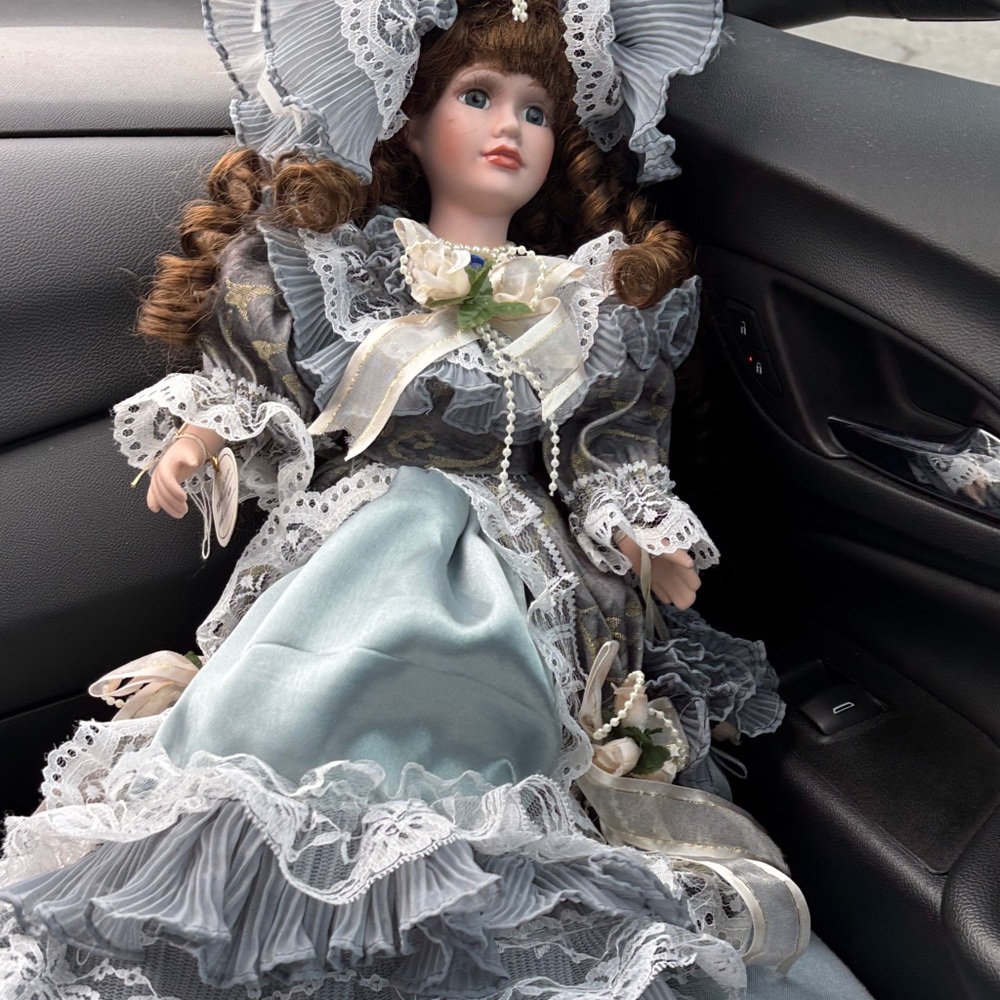 American Princess Porcelain Doll with Purple and Cream Dress